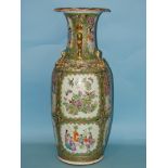 A 19th century Canton large baluster vase with gilt temple dog handles and painted panels in famille