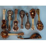 A collection of nine late-19th century tortoiseshell and mother-of-pearl miniature musical