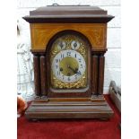 A late 19th century mahogany mantel clock, the brass dial with Arabic numerals, chime/silent and