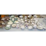 A collection of 19th century English tea-ware decorated blue and gilt, approximately 25 pieces and