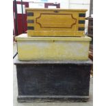 A stained pine tool chest, 100 x 56cm, 57cm high, (bottom af) and two smaller painted chests, (