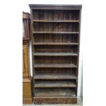 A stained pine open bookcase, 210cm high100cm wide.