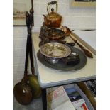 A copper warming pan and one other with  turned wood handles, a copper spirit kettle on stand, a