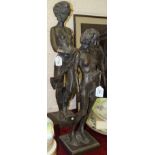 R Moll, two contemporary bronzed cold-cast resin sculptures of standing naked female figures, 63cm