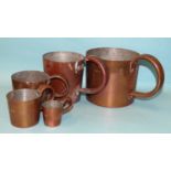 A collection of five graduated copper rum measures: ½ gallon, quart, pint, ½ pint and ½ gill, 15cm-
