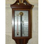 A modern stick barometer by Sewills, Liverpool, 96cm.