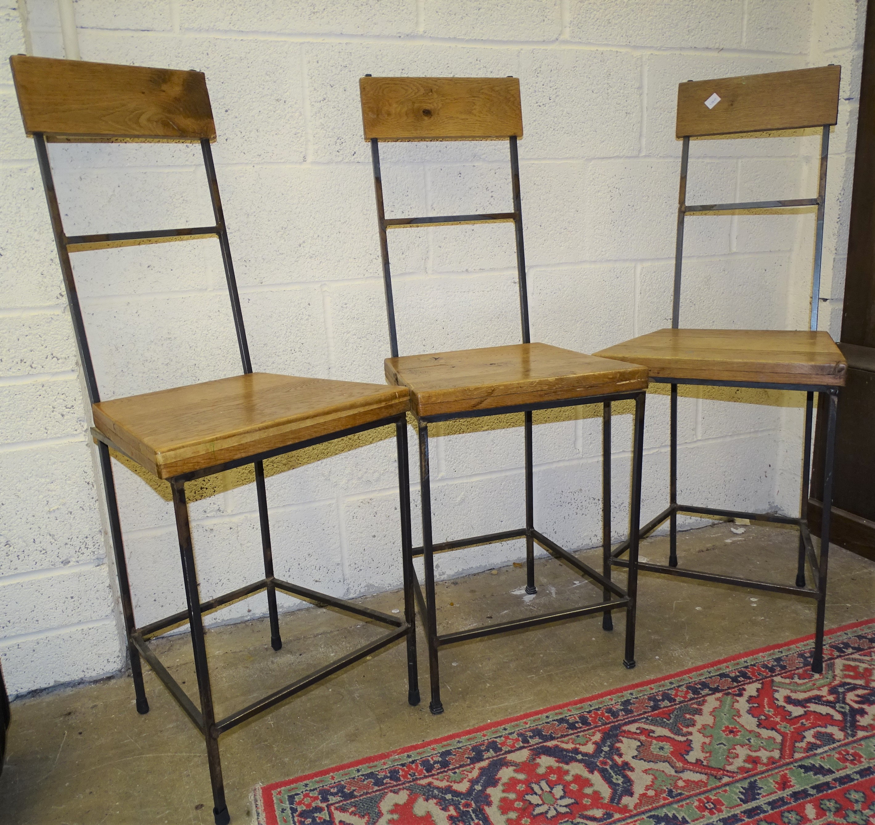 Three metal frame chairs with elm seats and backs, (3).