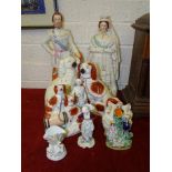 A pair of 19th century Staffordshire figures, Queen of England and Prince of Wales, 43cm high,