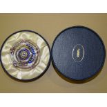 A Whitefriars facetted millefiori art glass paperweight, Silver Jubilee with central crown design,