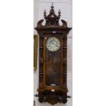 Gustav Becker, a late 19th century walnut cased Vienna striking wall clock, 147cm high.