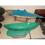 A vintage painted wooden pond yacht hull with lead-weighted keel, 68cm long and one other with