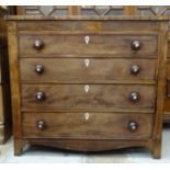 A 19th century mahogany chest, the rectangular top above two small frieze drawers and four graduated