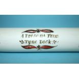 A large opaque glass rolling pin "A Present from Tyne Dock", painted with maritime rhymes and