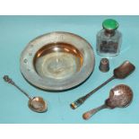 A silver Armada dish, London 1969, a silver caddy spoon, London 1894, two silver spoons, a thimble