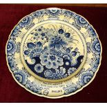 A Delft blue and white floral-decorated plate commemorating 'Philips in Egypt 1930 June 17th