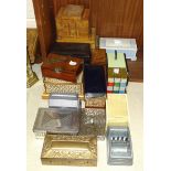 A collection of approximately sixteen wooden, Bakelite and metal cigarette boxes, (three musical).