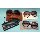 Three pairs of vintage sunglasses by Valentino, Christian Dior and Yves St Laurent, in pouches and