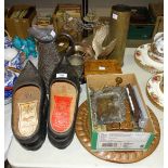 Two pairs of French vintage wooden galoshes, a brass shell case, a copper jug and various other