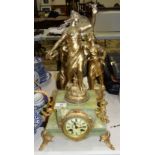 A gilt and green onyx finish three-piece clock garniture surmounted by classical female figures, a