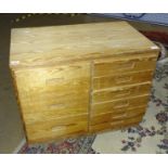 A modern pine low chest of nine small drawers, 80.5 x 48.5cm, 84cm high.