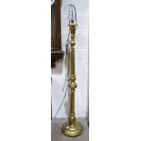 A gilt-painted wooden standard lamp, a jardinière stand on ring-turned supports and triform base and