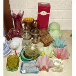 A large collection of coloured glassware, including vases, trinket sets, a lemonade set, drinking