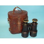 A pair of WWI field glasses, the eyepieces marked LEMAIRE FABT PARIS, in leather case stamped with
