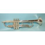 A Besson silver-plated trumpet marked "FB Made by Besson England International", (cased).