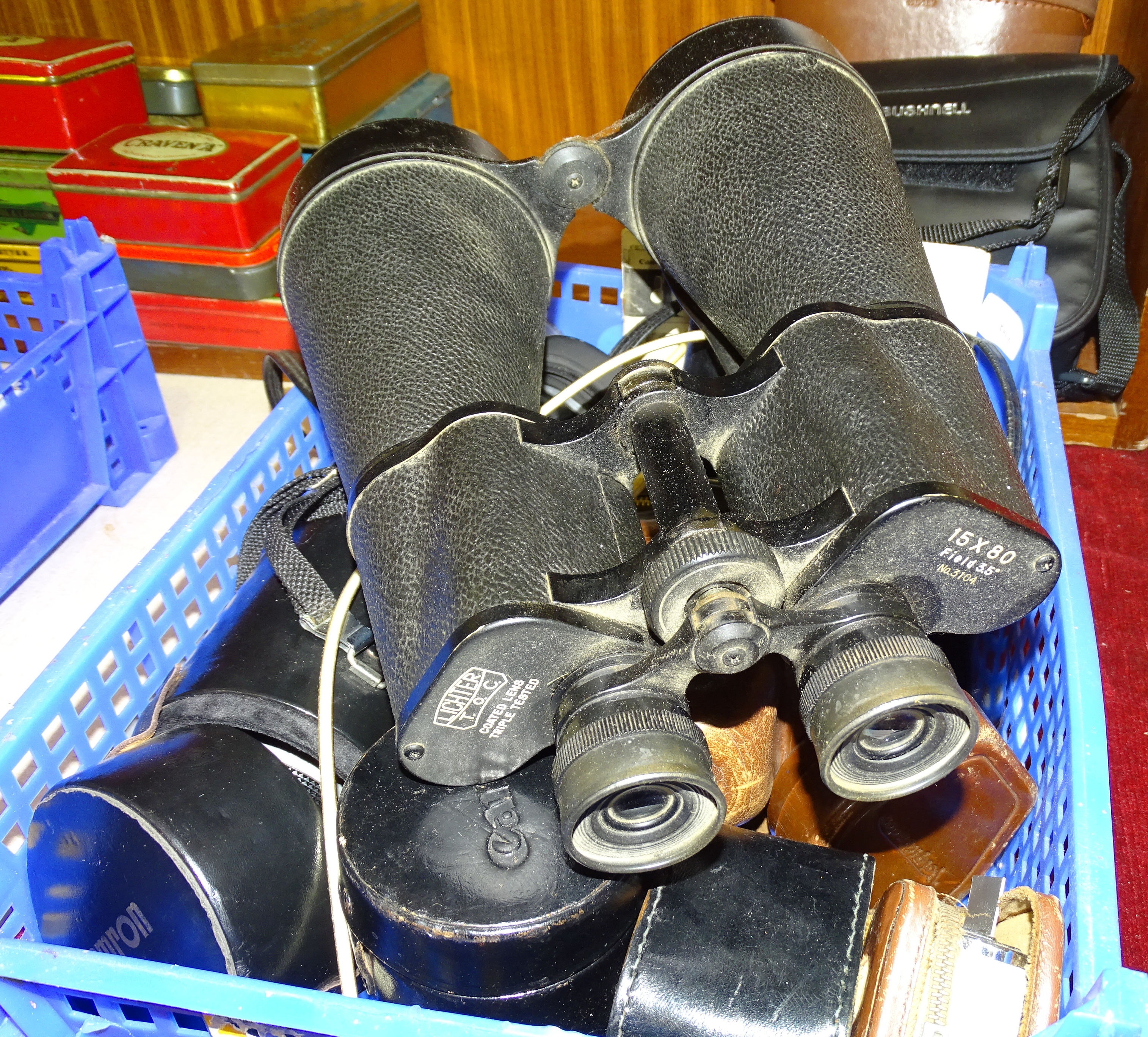 A pair of Lichter 15x80 binoculars, no.3104, a pair of Yashica 8x40 binoculars, a pair of