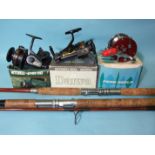 A Penn No.309M "Penn Peer" level-wind fishing reel, in box with instructions and lubricant, a