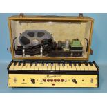 A Maestrovox electronic organ with 33 keys, (cased).