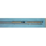 A Benwoods Special 9ft 2-piece split-cane salmon spinning rod.