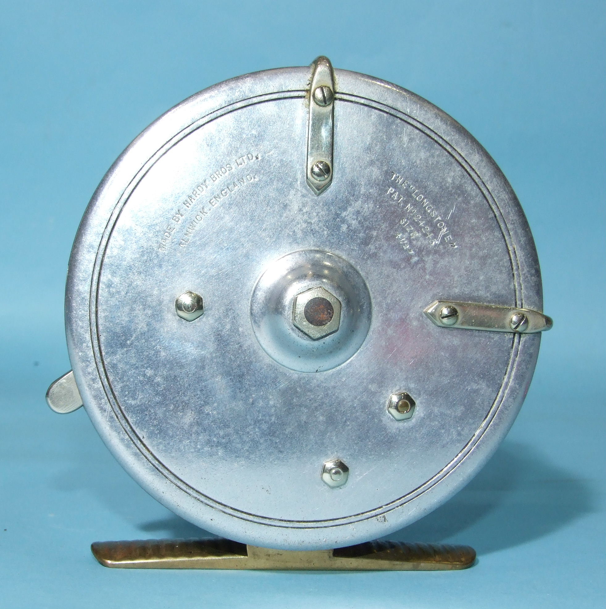 A Hardy Bros Ltd alloy 4½'' trolling reel with brass foot, line guard, drag lever and Bakelite - Image 2 of 4