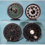 Four fly fishing reels: J W Young Pridex, Shakespeare Graphite, J W Young Rflex Saltwater and one