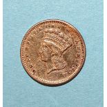 An 1861 USA gold one-dollar, (solder marks).