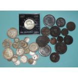 A collection of British and foreign coinage, including pre-1947 and other silver coinage.