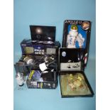 A Kenner Apollo 13 astronaut figure, a Mini Champs Lunar Moon Car 1971, a Dragon Wings Apollo 18/