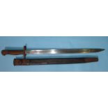 A British Army 1907 pattern bayonet by Wilkinson, the straight fullered blade with markings, in