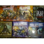 A collection of four Guillotine Games board games, comprising: Zombicide 'Cool Mini or Not', (
