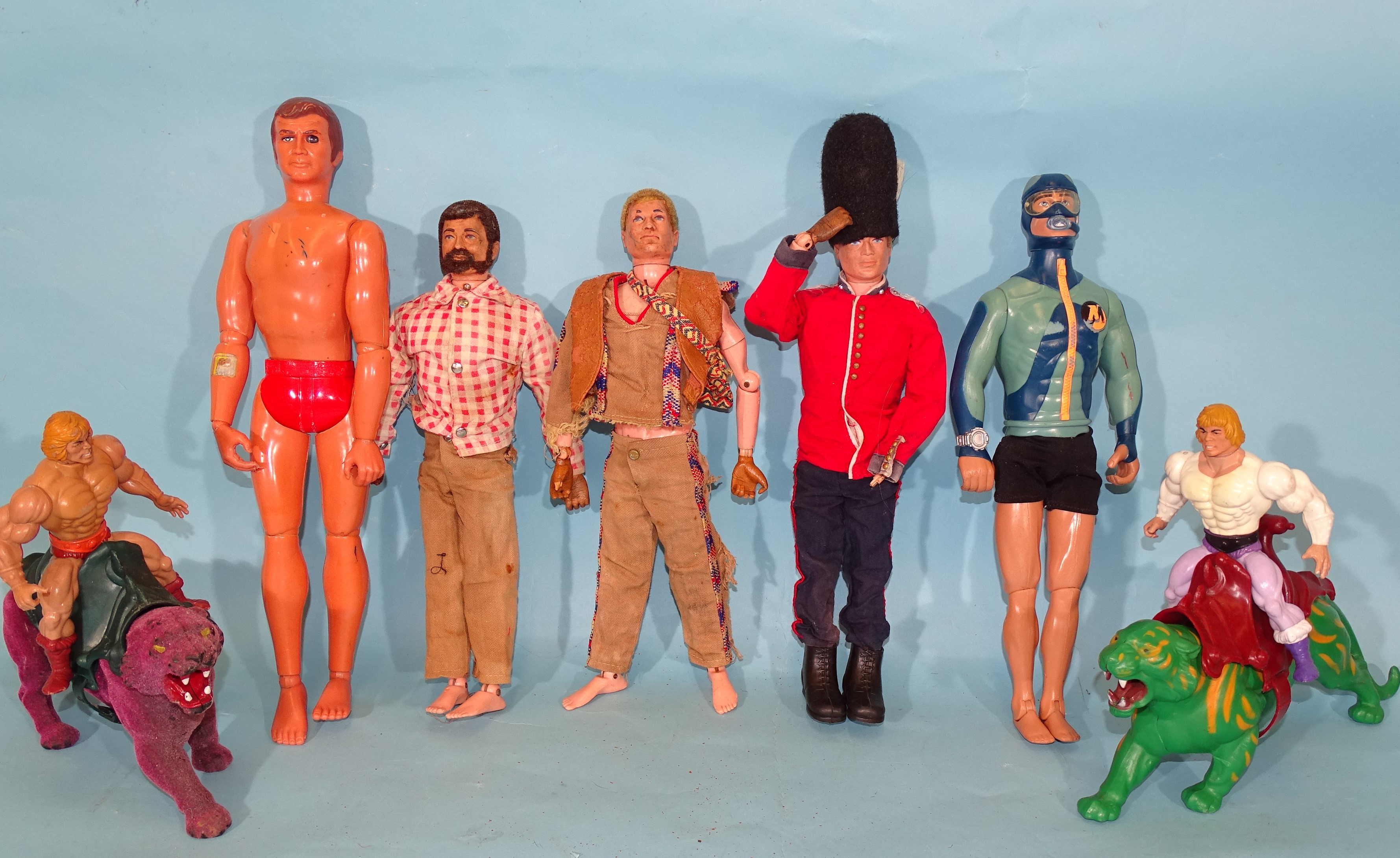 Three Palitoy Action Men marked © 1964, other figures, clothing and accessories.