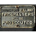 A cast iron railway sign "Southern Railway - Trespassers Will Be Prosecuted", 40 x 63.5cm.