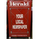 A newsagent's metal 'A' board advertising The Evening Herald, with label for News Vendors Equipment,