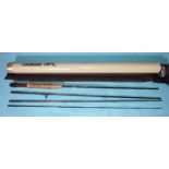 A Sage graphite III 586-4RPL 8ft 6'' 4-piece fly rod, in bag and tube.