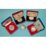 Four cased silver coins, comprising: Falkland Islands Silver Jubilee 50-pence, 1979 Isle of Man