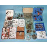 A large collection of mainly trout flies, in alloy and other containers.