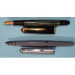 A Pelikan 400 fountain pen, green-striped with black cap, having a Pelikan 15ct nib, 13.2cm,