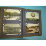 Approximately 120 postcards in an album and loose, mainly topographical, including RPs, local views,