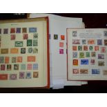 A small collection of British and World postage stamps, in three albums.