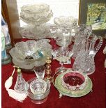 A pair of cut-glass water jugs, 23cm high and other glassware.