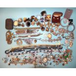 A quantity of large ear clips, diamanté and other costume jewellery.